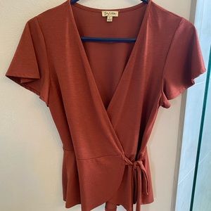 Lily white wrap style top